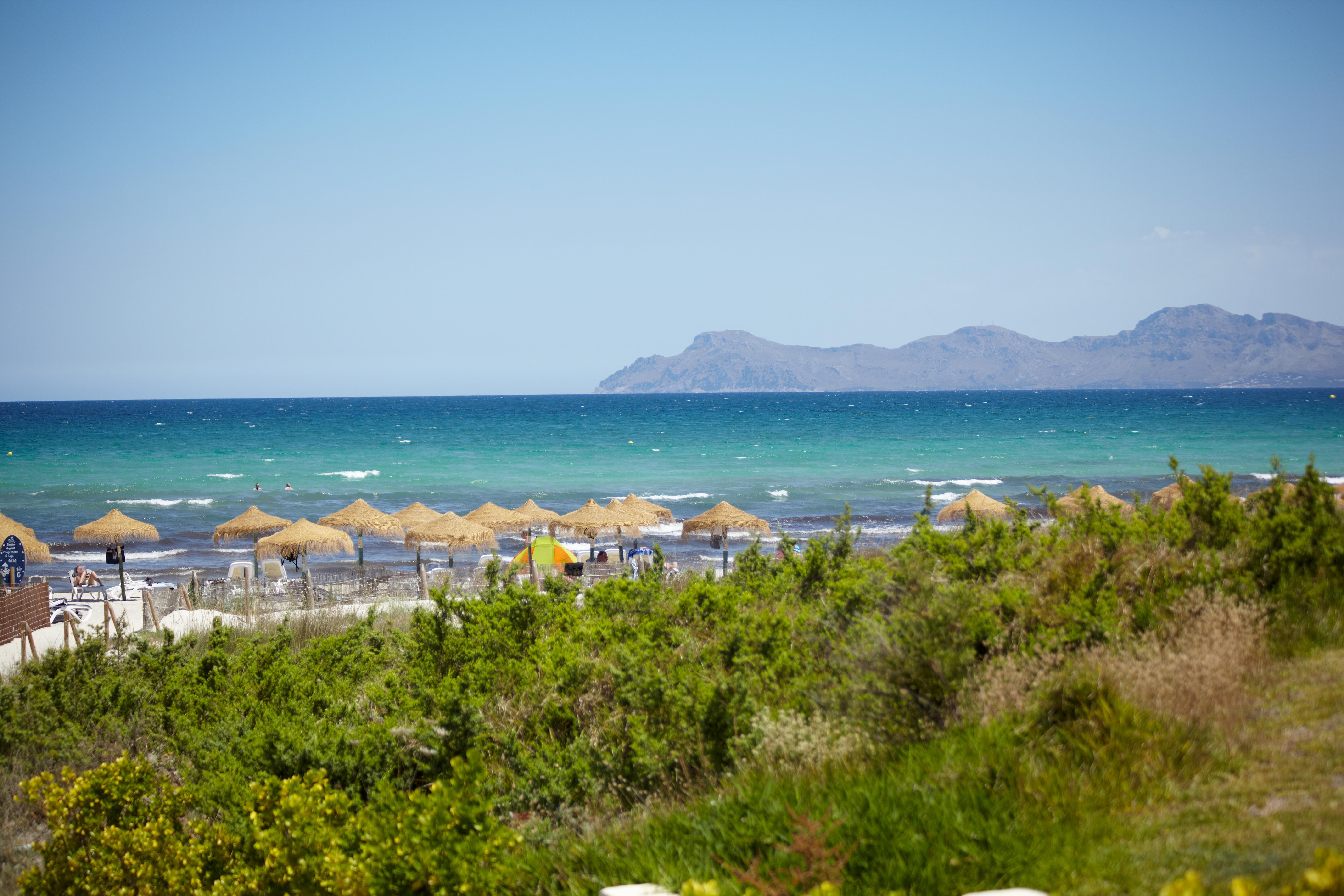 Grupotel Parc Natural & Spa Playa de Muro (Mallorca) Exterior foto View of the island of Rhodes from the beach of Marmaris